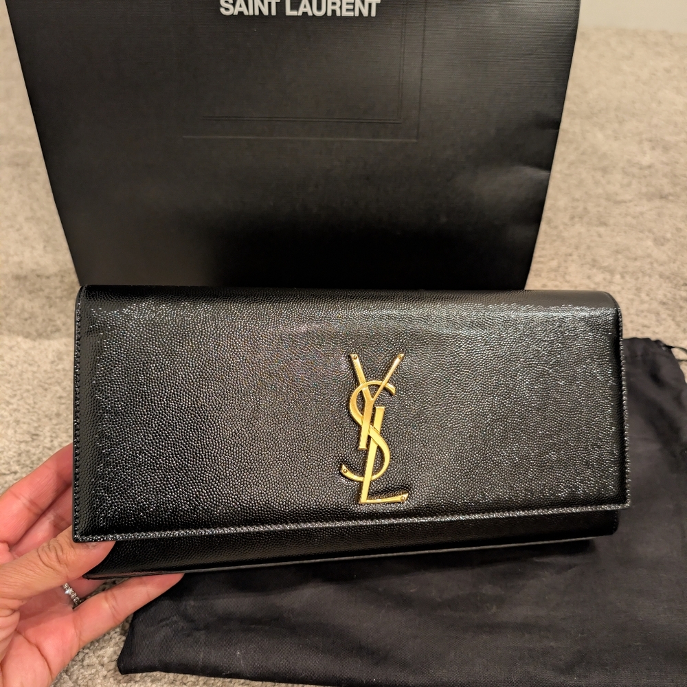 Saint Laurent Black Leather Clutch with Gold Emblem